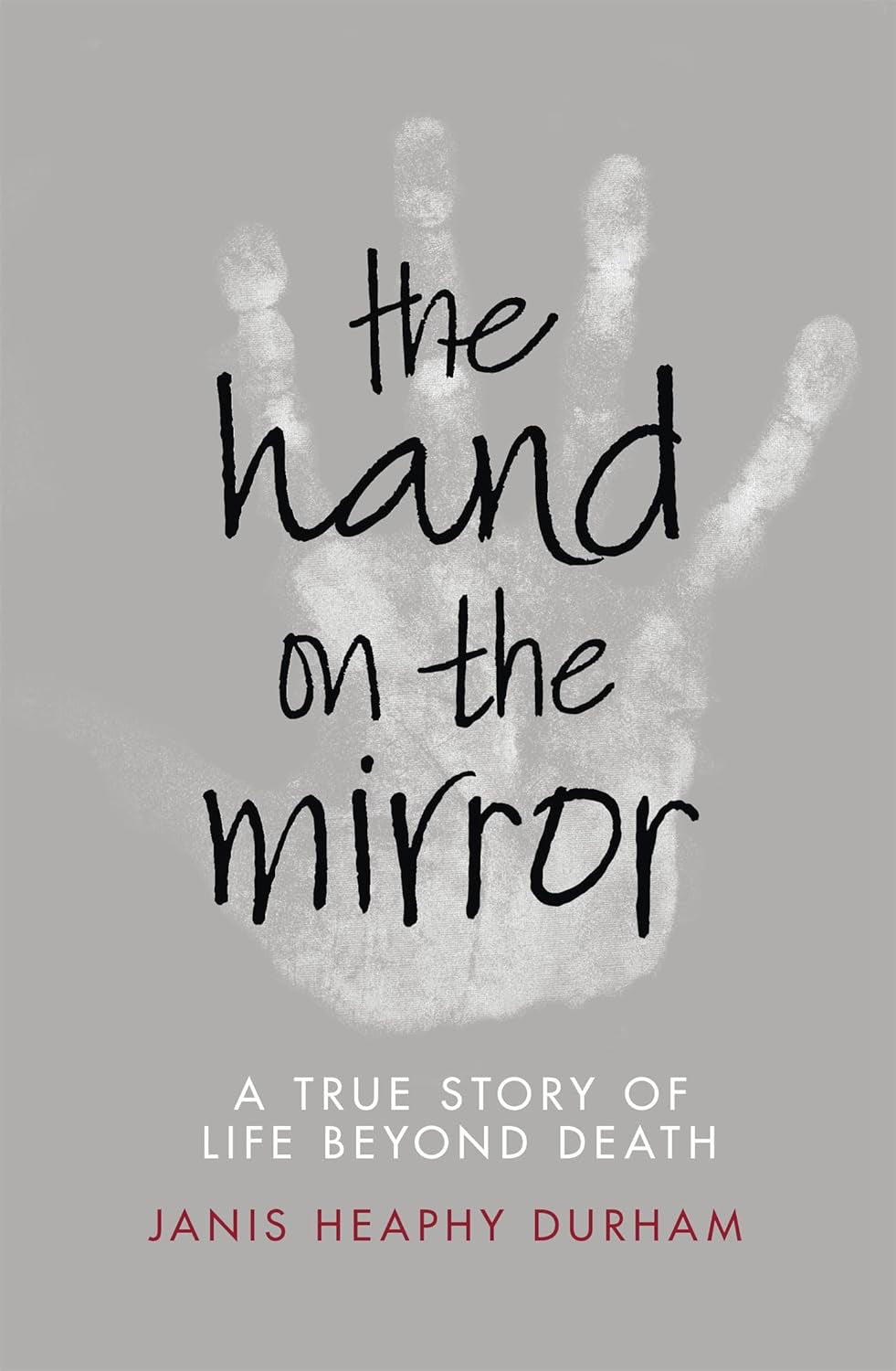 The Hand on the Mirror: A True Story of Life Beyond Death (Paperback, 288 pages) by Janis Heaphy Durham - £4 OFF